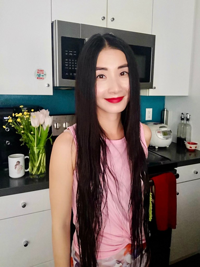 An aerial view of a field. A road runs through the upper right corner.